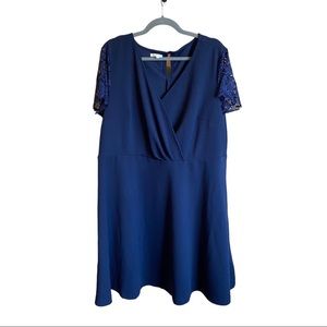 Navy blue one length dress with lace cap sleeves. Brand new without tags.